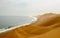Sand dunes meet the coast