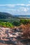 Sand dunes at Patara. Colorful meadow at seaside with rocks and mountain.