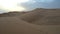 Sand dunes in the Sahara desert with footsteps