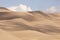 Sand dunes with shadow and light making patterns