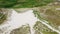 The sand dunes in the south of Ireland, top view. Sand hills and green plants, drone video. Beautiful hilly terrain. The dunes of
