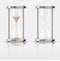 Sand falling in the hourglass on dark background
