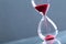 Sand glass, modern hourglass showing last second or last minute or time out. With copy space