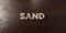 Sand - grungy wooden headline on Maple - 3D rendered royalty free stock image