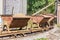 Sand loaded railroad hopper cars in an old facto