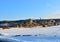 Sand mining in winter conditions in an industrial quarry.