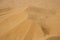 Sand mounds on the beach.Desert Dunes. closeup of sand pattern of a beach in the summer