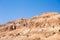 Sand mountains against the blue sky