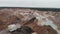 Sand quarry, aerial drone view. Opencast mining operations. Open-pit mine. Huge industrial excavator at work. Ecology and mining i