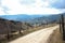 Sand Road with Andes Mountains in background on Sumapaz Paramo