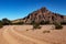 Sand road, dirt road and footprint Sandstone rock formations eroded by water and wind in the Talampaya Canyon National Park,