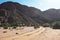 Sand road, dirt road and footprint Sandstone rock formations eroded by water and wind in the Talampaya Canyon National Park,