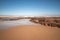 Sand, rocks and waves in a beach