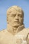 Sand sculpture of emperor napoleon against blue sky