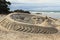 Sand sculpture with Maori imagery, Mount Maunganui, New Zealand