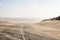 Sand Storm Across Lonely Desert Road in Southern Namibia taken i