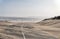 Sand Storm Across Lonely Desert Road in Southern Namibia taken i