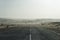 Sand Storm Across Lonely Desert Road in Southern Namibia taken i