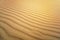 Sand Texture. Brown sand. Background from fine sand. Sand background. yellow dune in the sun. The sun shines on the sand