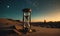 A sand timer with sand on the ground in front of it.