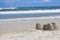 Sand towers on the calm beach.