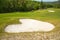 Sand trap in a golf course sand bunkers heart shape