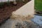 Sand wheeling. garden wheelbarrow carries a worker and pours