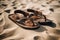 sandals on the sand on the beach on a sultry summer day.