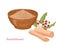 Sandalwood powder in bowl, Chandan sticks and  flowering plant with green leaves