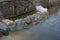 Sandbags for artificial barrier in a river protecting a construction site