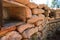 Sandbags piled up in a trench to protect soldiers and narrow slits to look out and shoot from