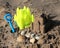 Sandcastle building with bucket and spade