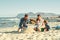 Sandcastle building, parents and children at beach with bonding, love and support. Baby, mom and dad together with kids