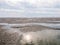 Sandflats at low tide of tidal sea Waddensea near Boschplaat, Te