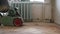 Sanding hardwood floor with the grinding machine. Repair in the apartment