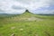 Sandlwana hill or Sphinx with soldiers graves in foreground, the scene of the Anglo Zulu battle site of January 22, 1879. The