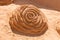Sands sculpture in the form of a rose blossom