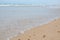 Sands and waves at North Sea cost in Denmark. Wide, sandy beach on the North Sea