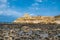 Sandstone butte of Salt Pans, Xwejni Bay, Xwejni, Gozo Island, Malta