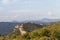 Sandstone cliffs and green forest of Cap Canaille, Falaises Soubeyranes, Southern France