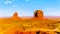 The sandstone formations of West Mitten Butte and Merrick Butte in the desert landscape of Monument Valley
