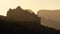 Sandstone ridges silhouetted against morning sky