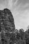 Sandstone rock formation the locomotive in German-Saxon Switzerland with climbers on the right, vertical photo