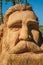 Sandstone sculpture of a bearded man