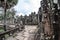 Sandstone slab walkways surround Bayon Temple in Angkor Thom, Siem Reap