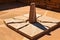 sandstone sundial casting a sharp shadow at midday