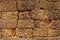 Sandstone wall at the ruins of the Preah Khan temple in Siem Reap, Cambodia.