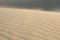 A sandstorm in the Arabian desert. Sand close up.