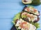 Sandwich with avocado red fish egg lunch lemon gourmet blue wooden appetizer rustic