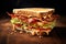A sandwich with bacon, lettuce, tomato, and cheese on a wooden cutting board